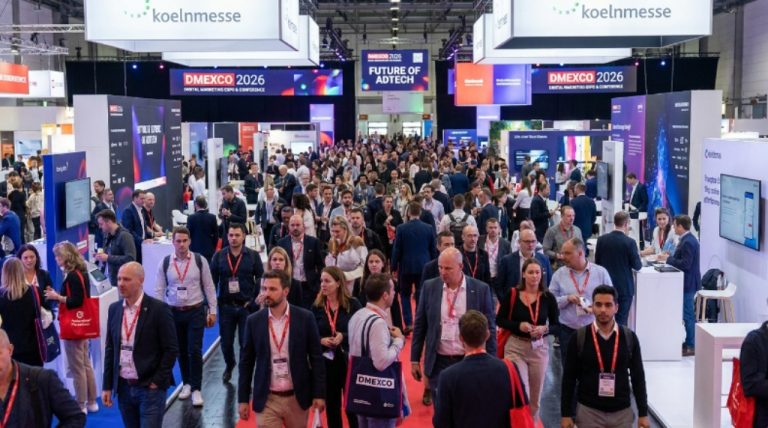 Thousands of digital marketing professionals walking the busy expo floor at DMEXCO 2026 inside Koelnmesse, Cologne, Germany
