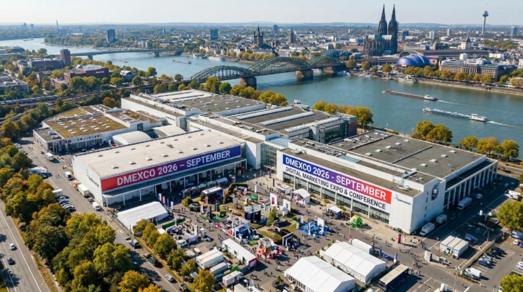Thousands of digital marketing professionals walking the busy expo floor at DMEXCO 2026 inside Koelnmesse, Cologne, Germany
