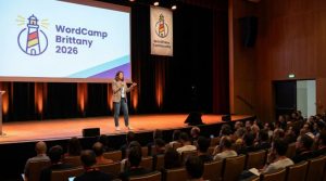 Speaker presenting on stage at WordCamp Brittany 2026 conference
